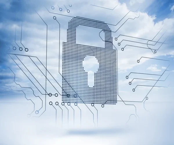 Giant padlock next to a circuit board with blue sky on the background